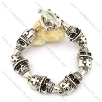 6 big skull head with cross bracelet -b001475