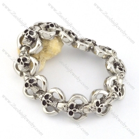 21cm biker bracelet formed by 12 skull heads b002044