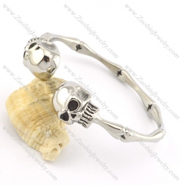 2 skull heads stainless steel bangle b001991