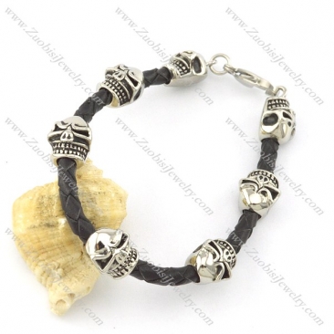 mens black leather bracelet with 7 stanless steel solid skull heads b001798