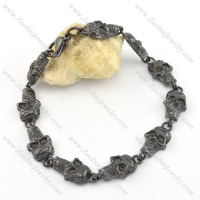 10 small black skull heads bracelet for biker b002341