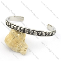 multi-skull heads bangle in 316L stainless steel b002551