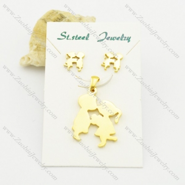 gold tone boy and girl pendant and earring set s000929