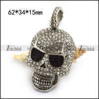 Skull Face Pendant full of Clear Rhinestones and 2 Black Rhinestones Eyes p004321