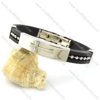 rubber bracelets in black color with steel metal stamping a cross -b001463