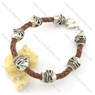 brown braided leather bracelets for men with 7 ugly skull heads b001799