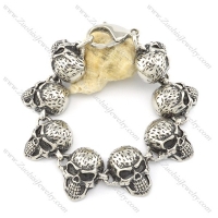 8 big skull head stainless steel bracelet b001596