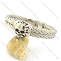 skull bangle with 2 wide wires b002457