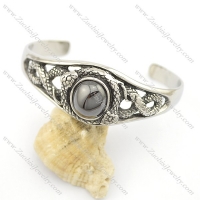 stainless steel snake bangle with round hematite color stone b002493