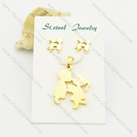 gold tone boy and girl pendant and earring set s000929