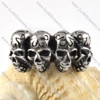 Four Skulls Ring in Stainless Steel - r000082
